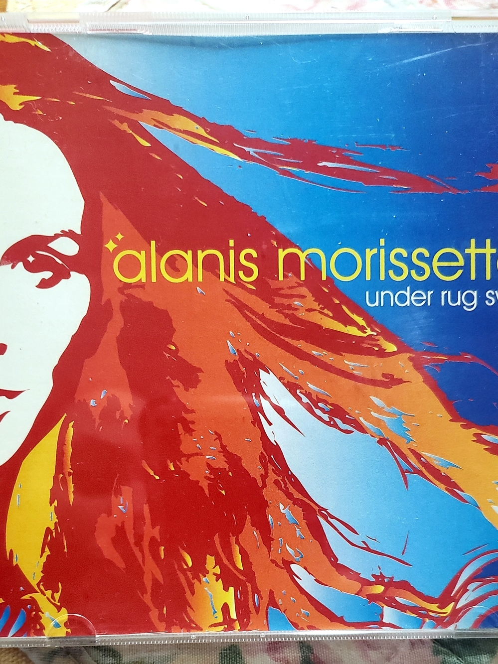 Alanis Morissette- Under Rug Swept (Red & Blue Artwork)